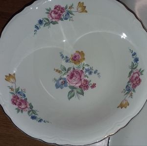 Antique glass bowl with gold around the edges